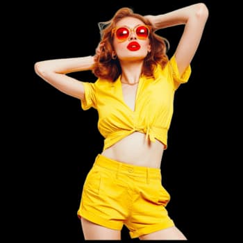 Fashion model in bright yellow outfit
